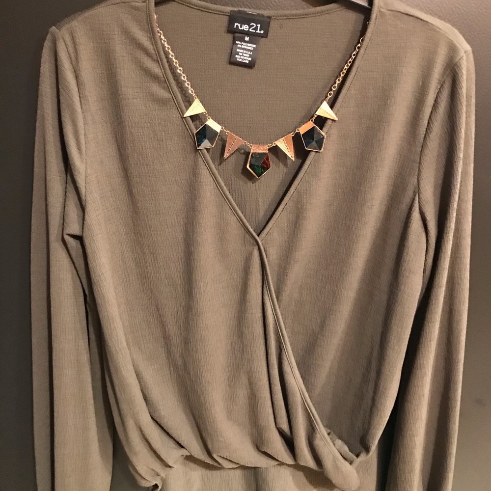 Green blouse with necklace